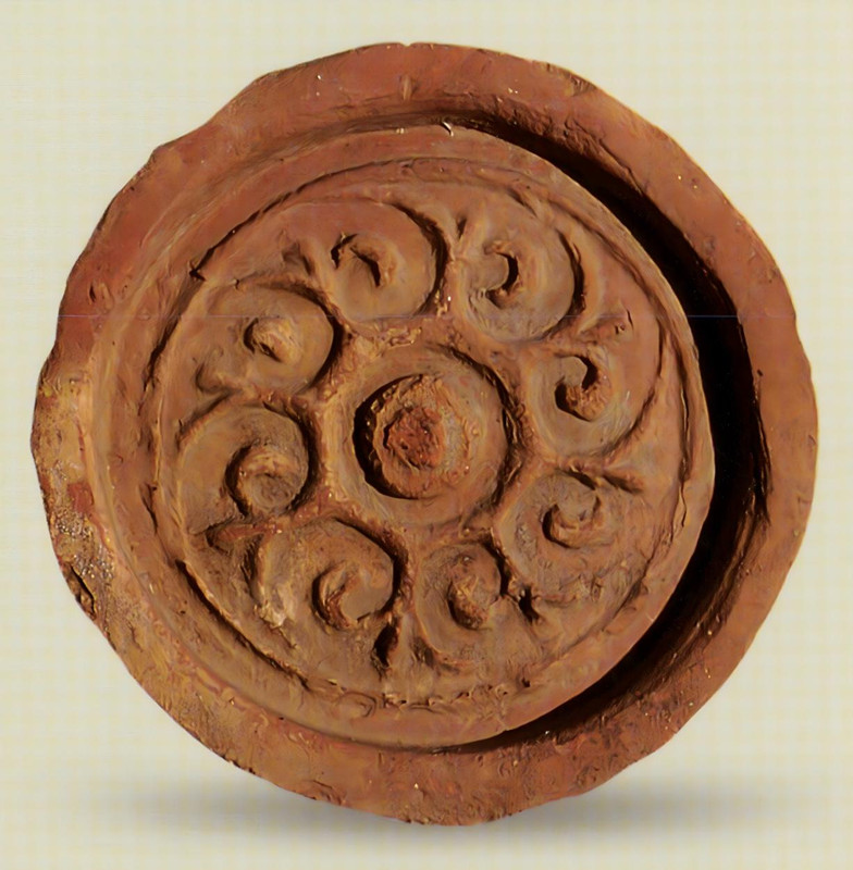 图4 集安丸都山城出土忍冬纹瓦当_副本.jpg