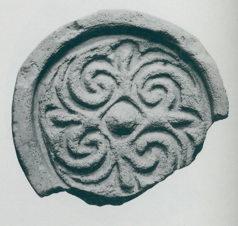 图5 平壤出土忍冬纹瓦当_副本.jpg