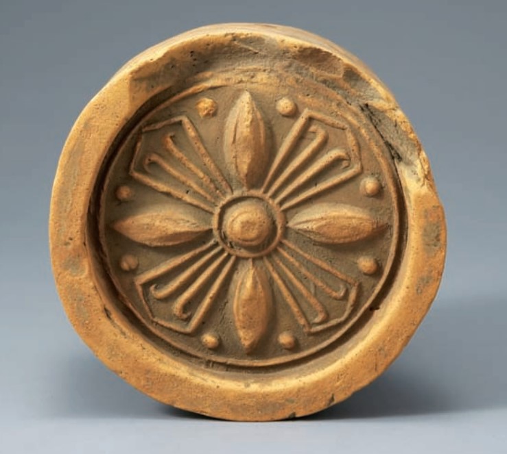 图7 高句丽“四分法”构图复合主题纹饰瓦当.jpg